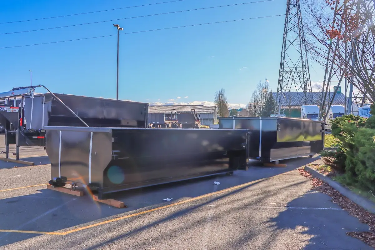 Roll-off dumpster ready for waste disposal at job site for 2 Yard Dumpster Rental in Bowleys Quarters